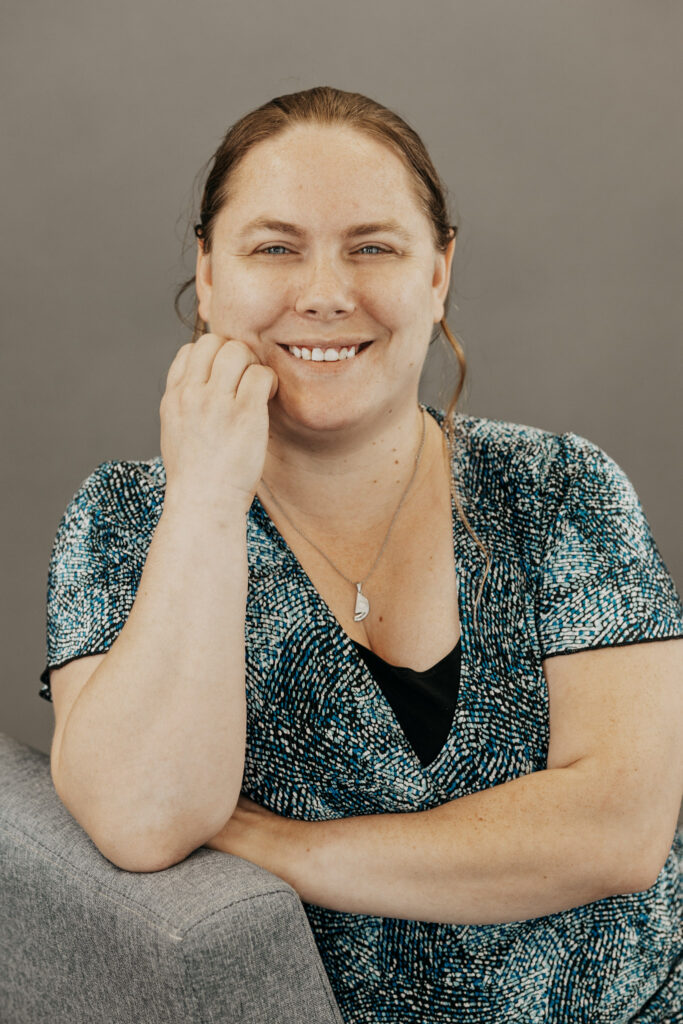 Ashley Kitchen-Sweet, LMHC and LCMHC, smiling professional therapist in Massachusetts and Vermont.